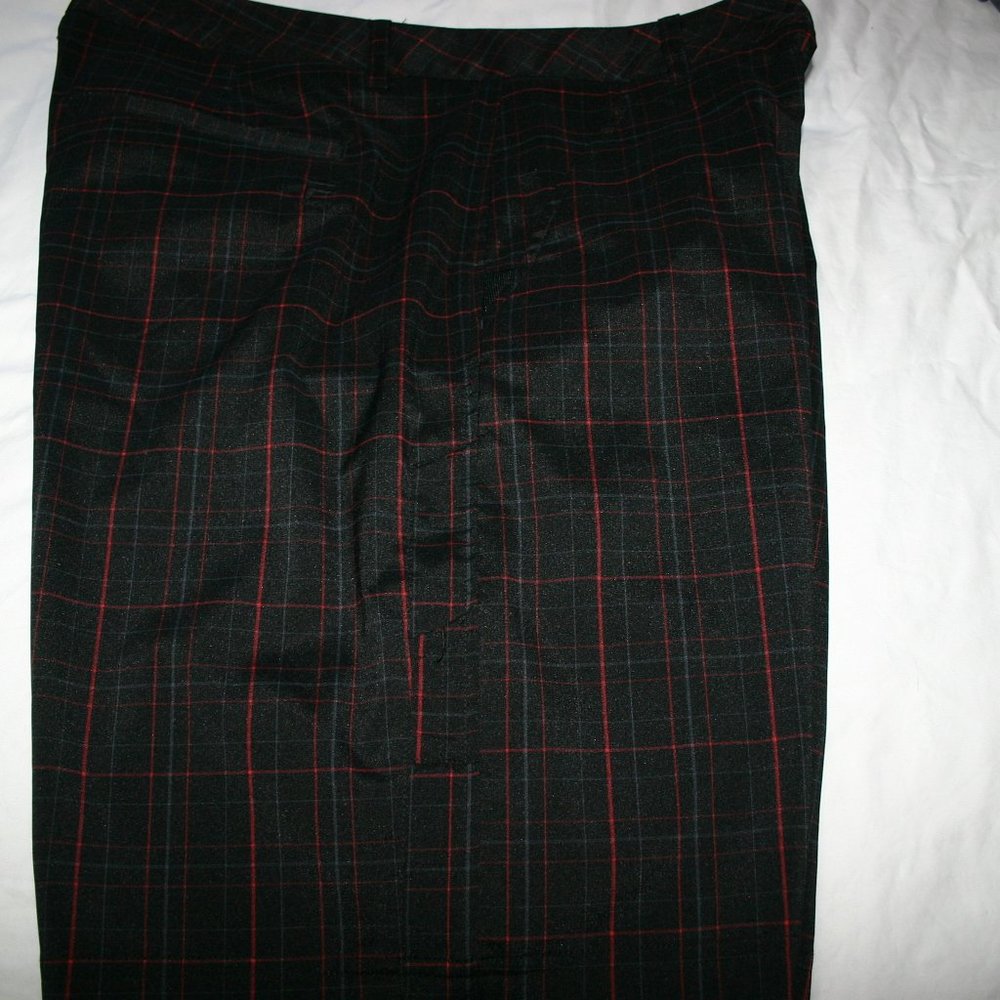Fantastic Golf shorts. Black with a red stripe. I have the shirt to match 38w